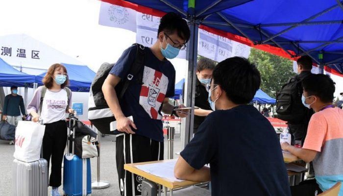 Beijing’s universities welcome students back to campus under COVID-19 measures